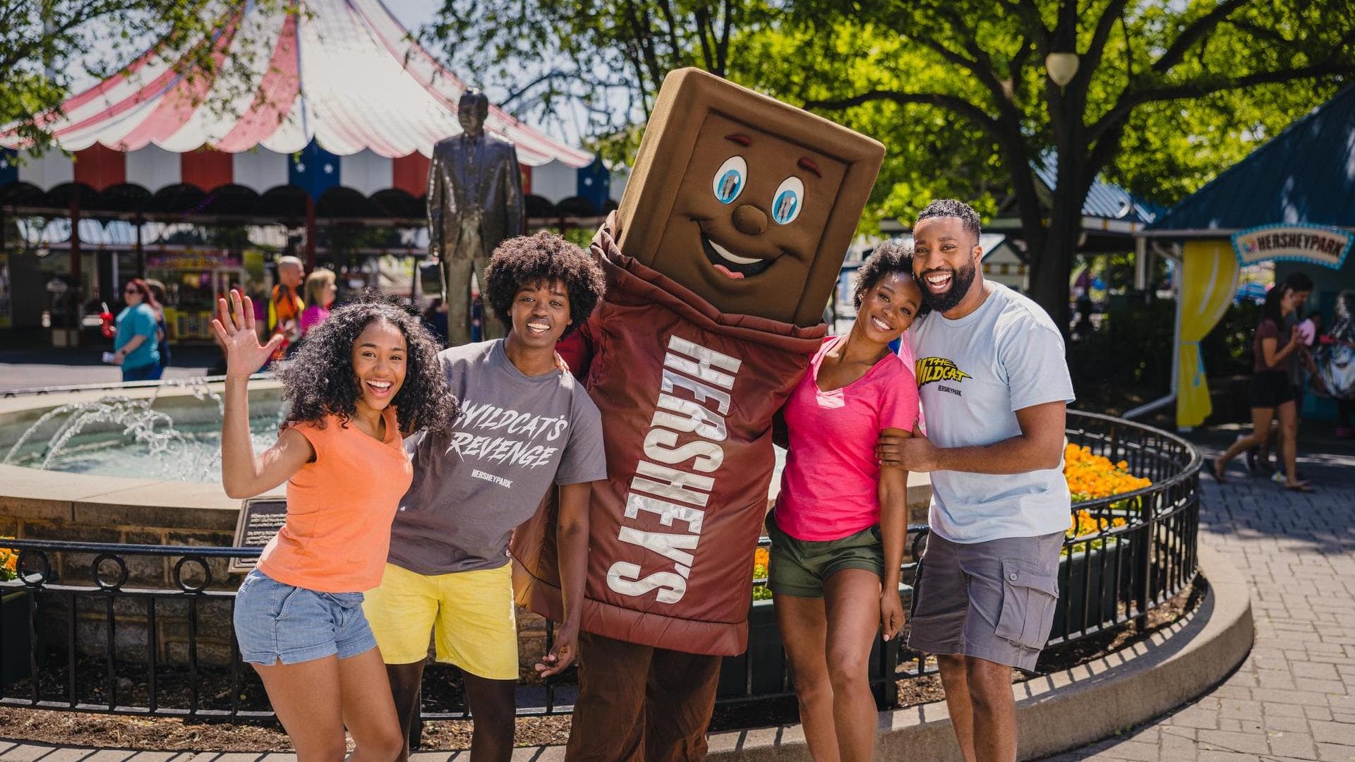 family posing with hershey bar