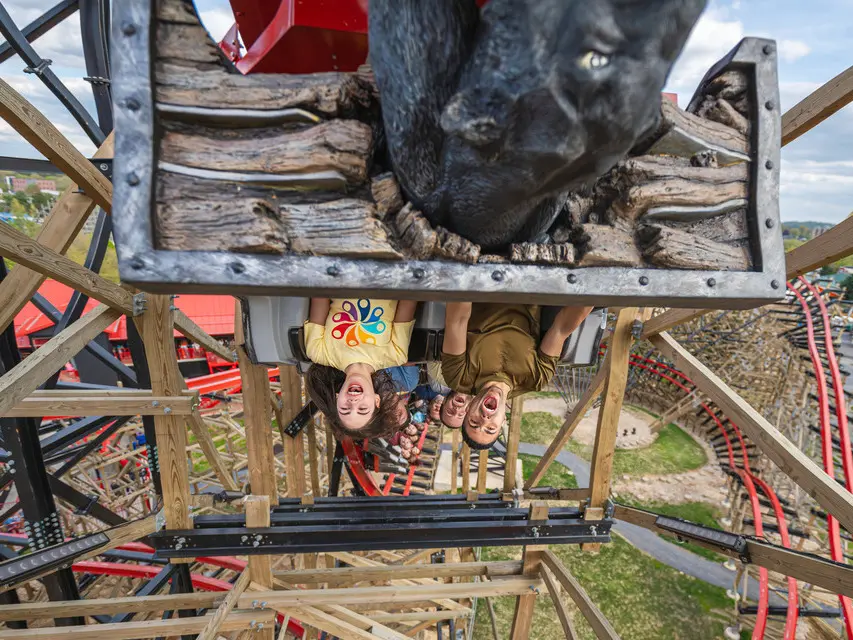 father and daughter upside down on wildcats revenge roller coaster