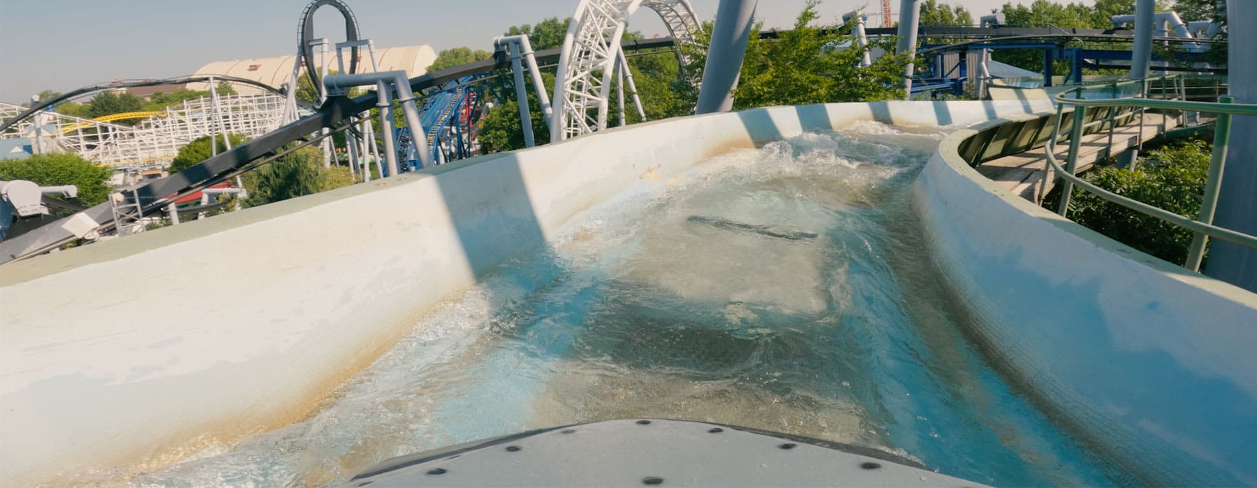 Wide shot view of the Coal Cracker about to slide down the drop.