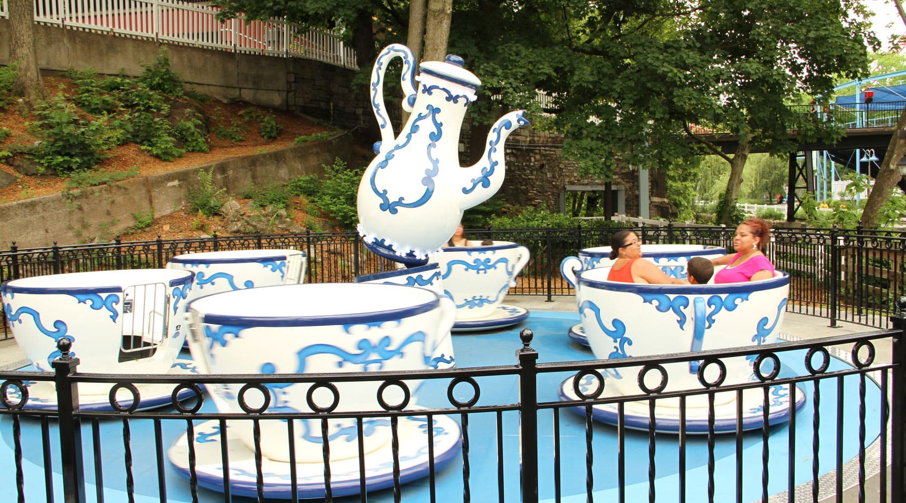 Family riding Tea Cups Ride at Hersheypark