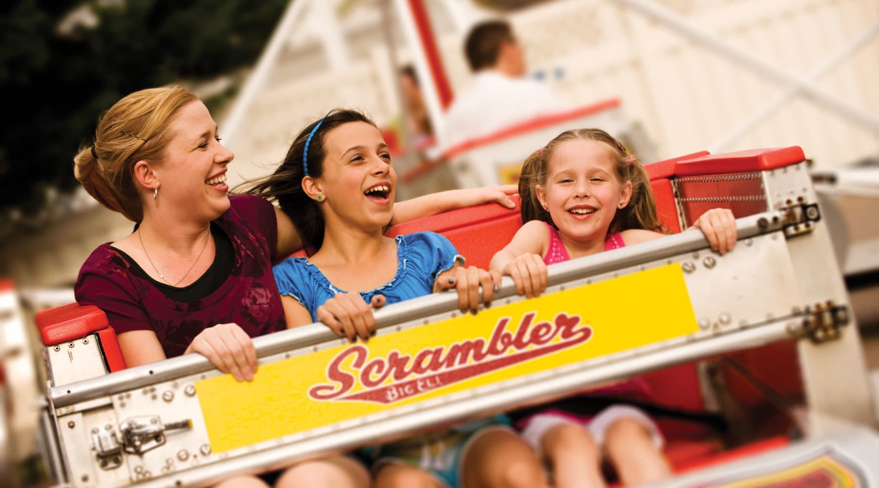 Mom and Daughters on Scrambler Ride at Hersheypark