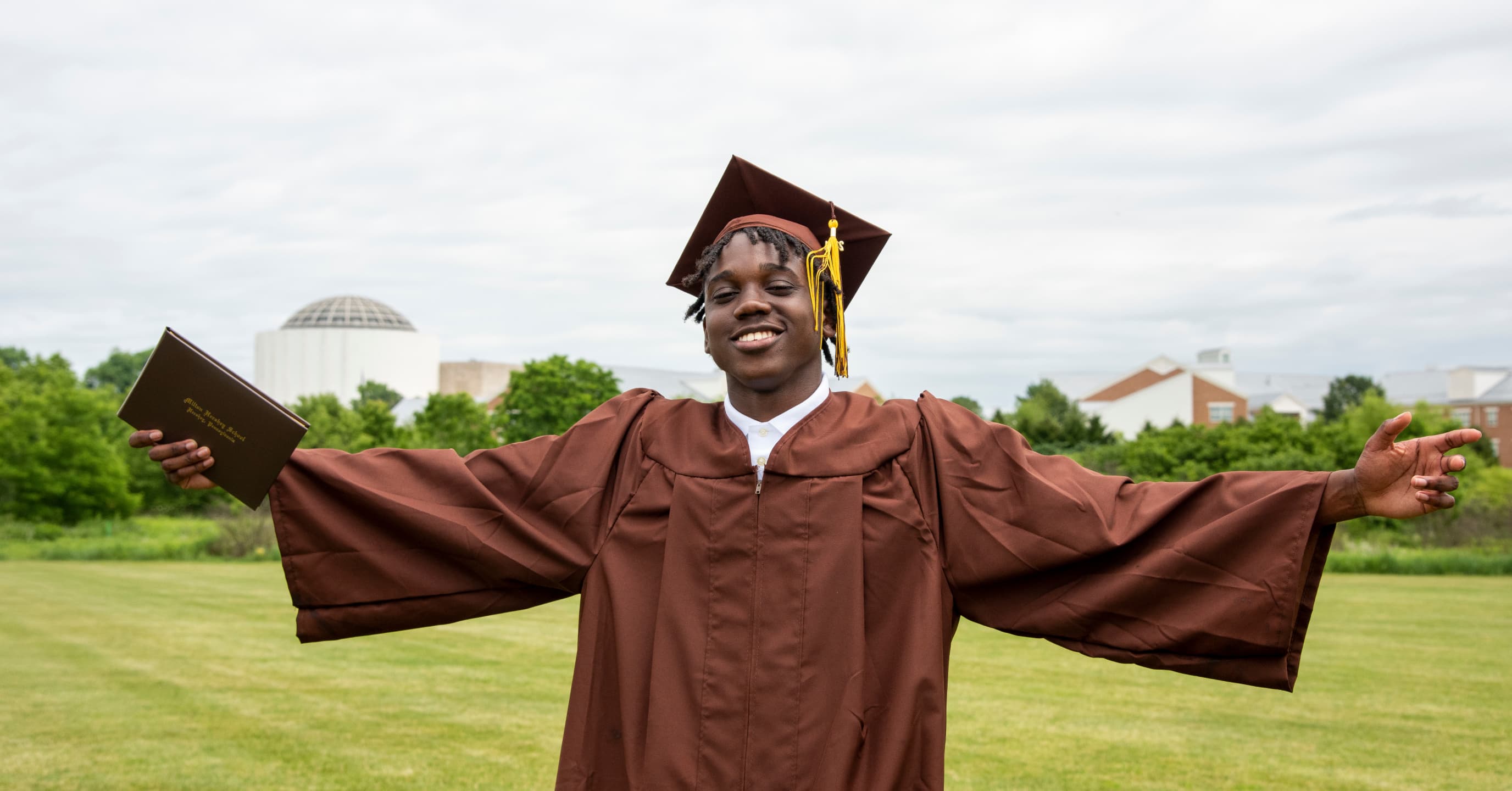 milton-hershey-school-student-wearing-a-cap-and-gown.jpg