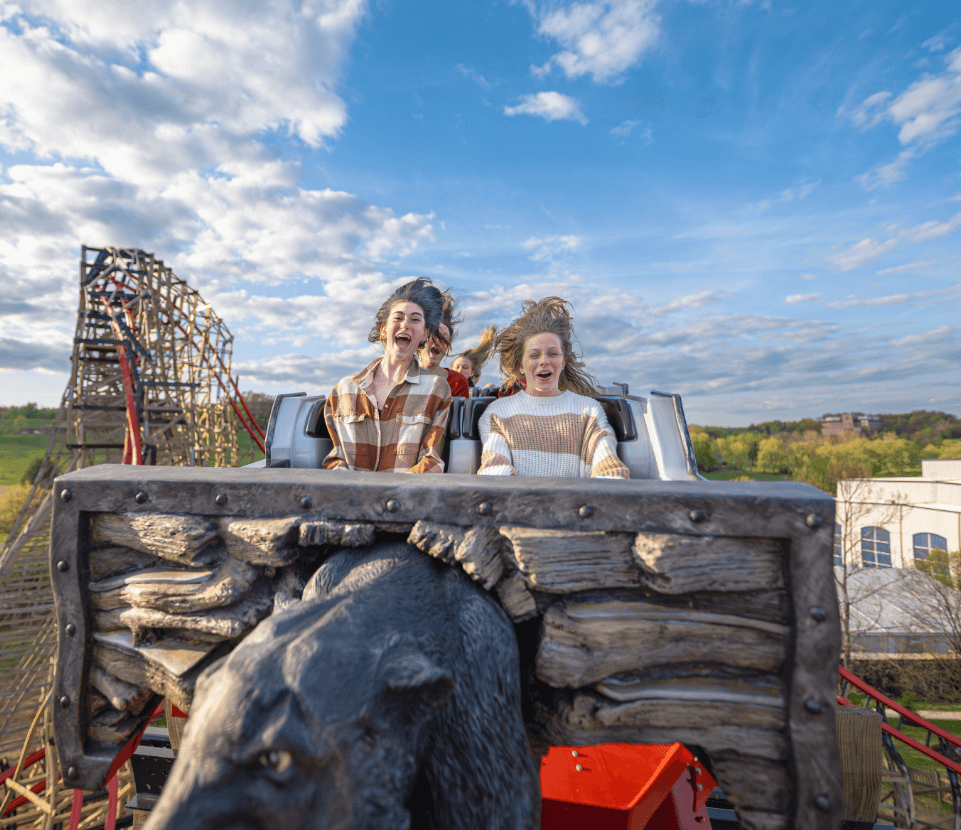 Riders on a rollercoaster during Hersheypark Dark Nights