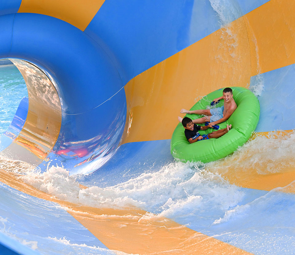 Children riding the Breakers Edge Water Coaster